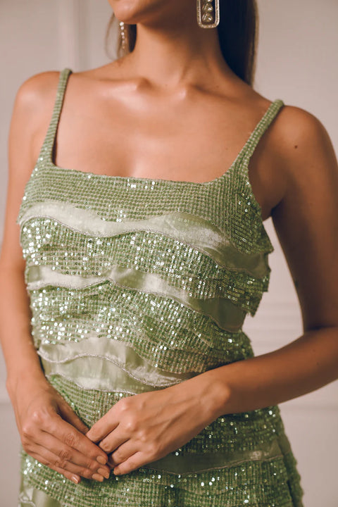 A mint green sequin co-ord set with layered detailing, crafted for effortless movement and modern flair. Designed for cocktail nights, sangeet celebrations, festive  soirées, and fashion-forward parties