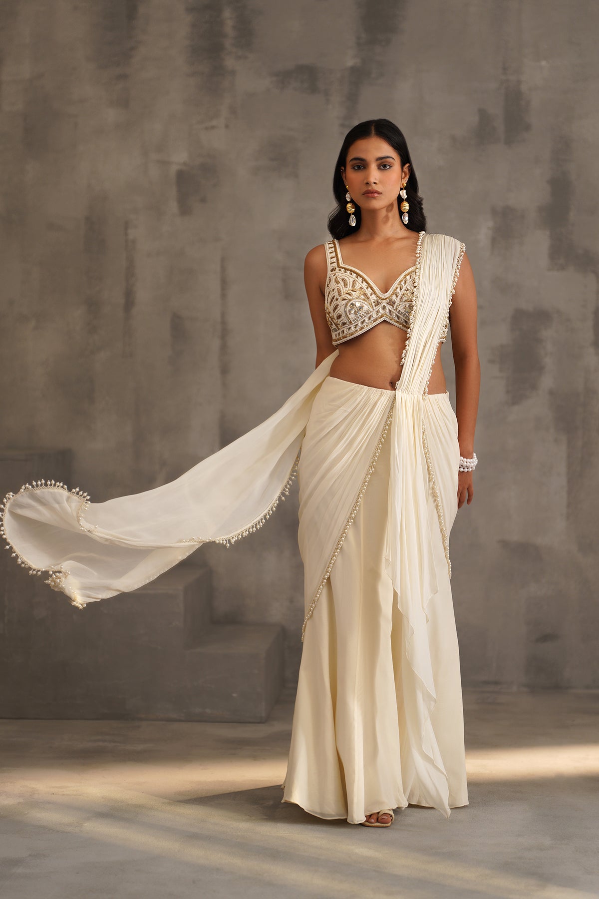 Ivory Embroidered Blouse And Stitched Draped Saree