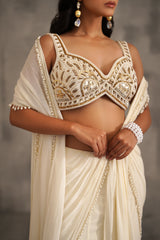 Ivory Embroidered Blouse And Stitched Draped Saree