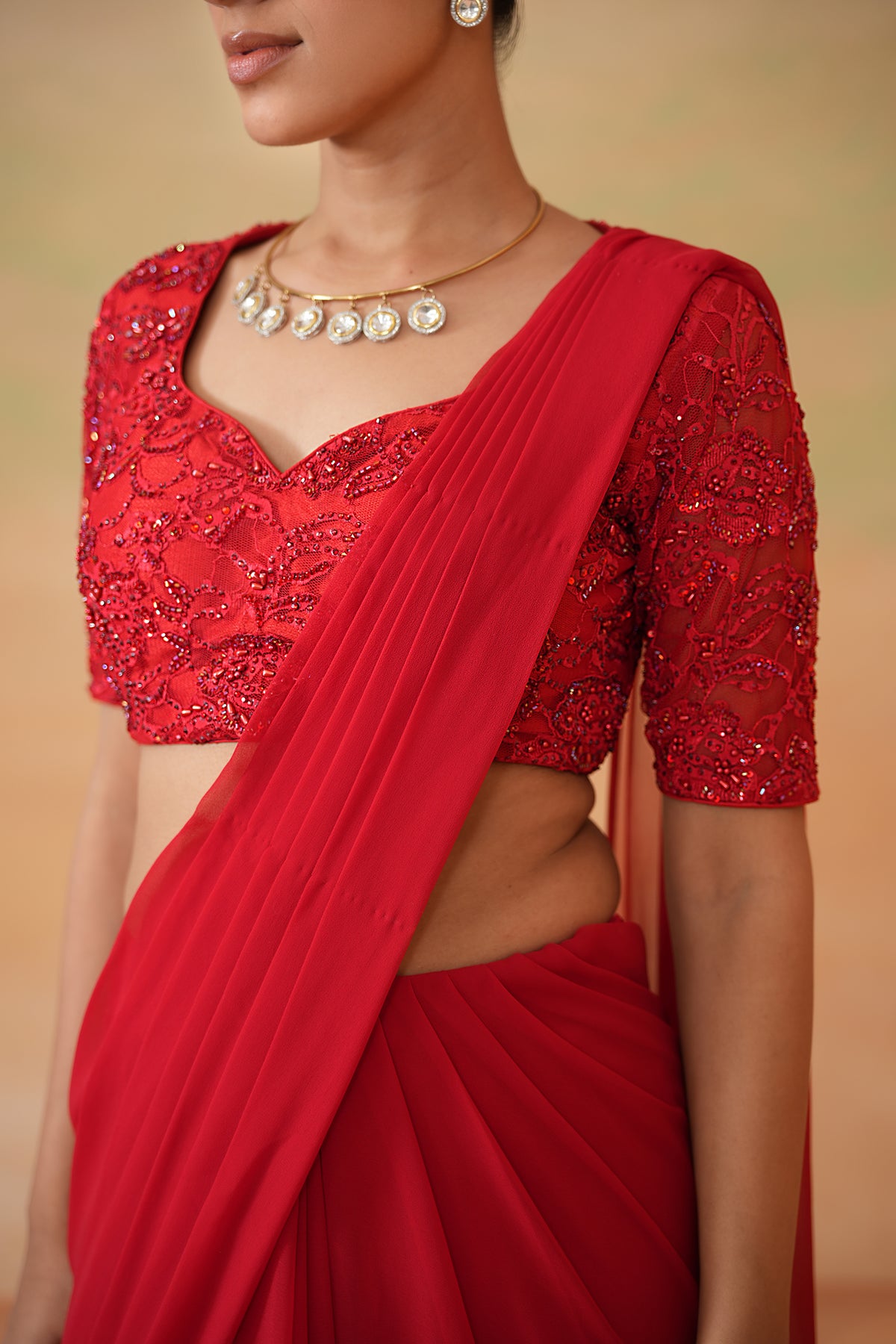 Red Embroidered Blouse And Stitched Saree Set