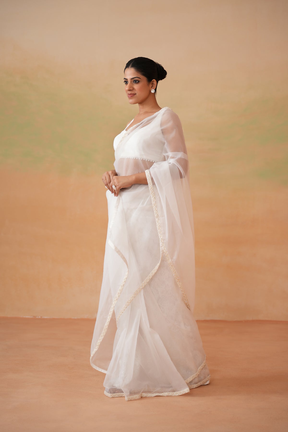 Ivory Blouse And Stitched Saree