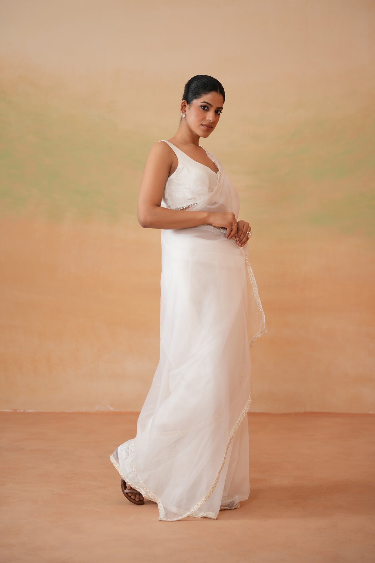 Ivory Blouse And Stitched Saree