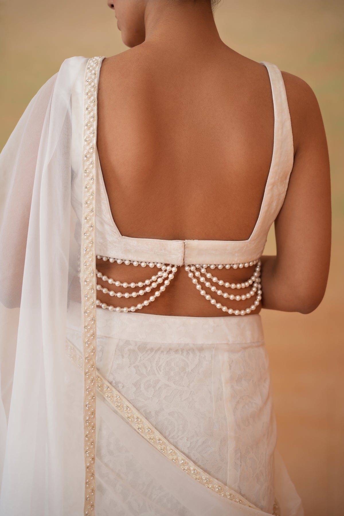 Ivory Blouse And Stitched Saree