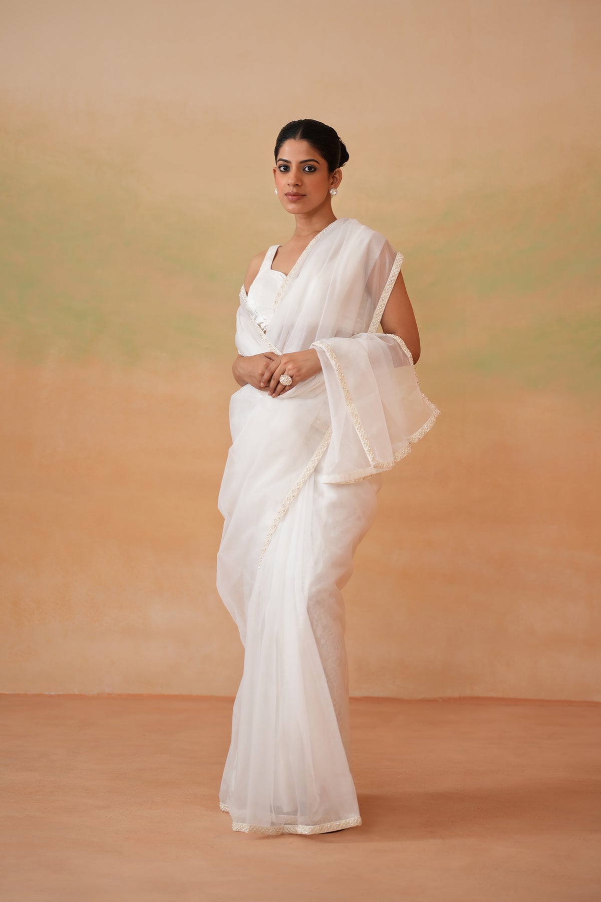 Ivory Blouse And Stitched Saree