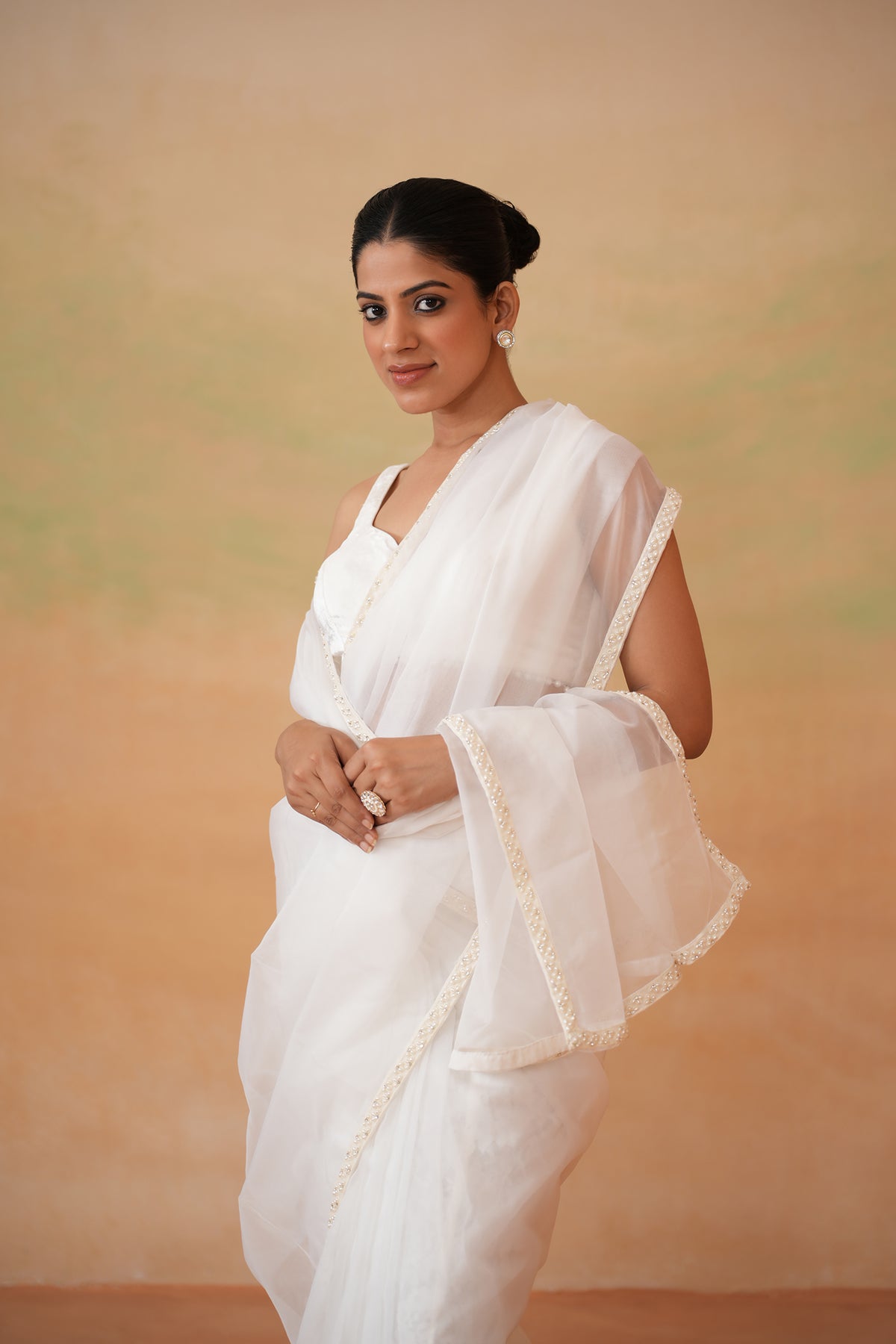 Ivory Blouse And Stitched Saree