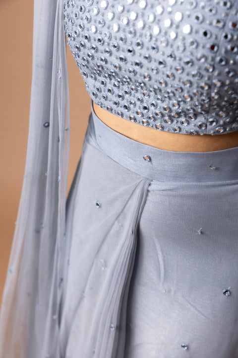 Pre Draped Saree In Net With Delicate Mirror Work With Pearls Paired With A Mirror Worked Blouse