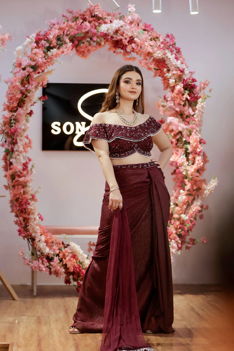 Wine Shimmera Off Shoulder Blouse With Drape Skirt And Net Dupatta